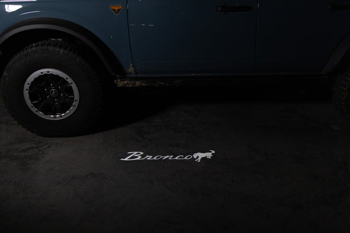 2021 - 2026 BRONCO LED MIRROR LOGO PUDDLE LIGHTS - F150LEDs.com